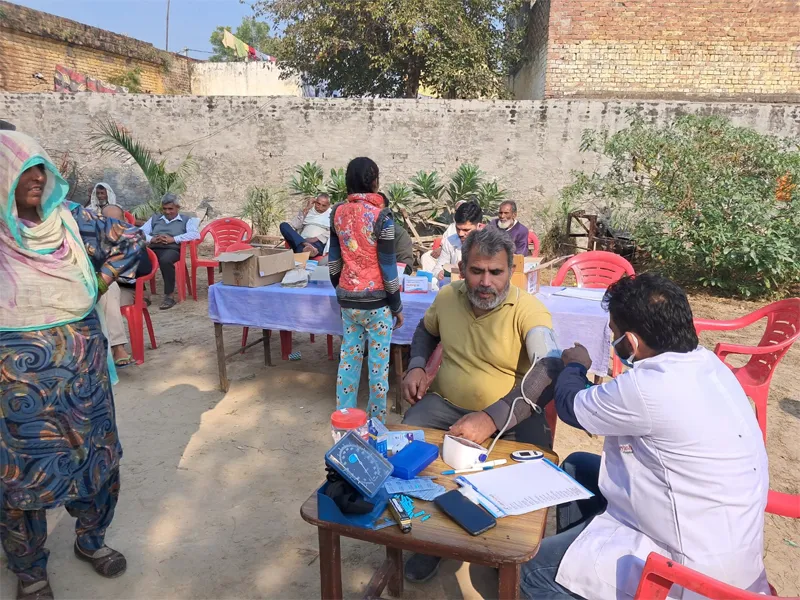 Blood pressure checkup at community camp